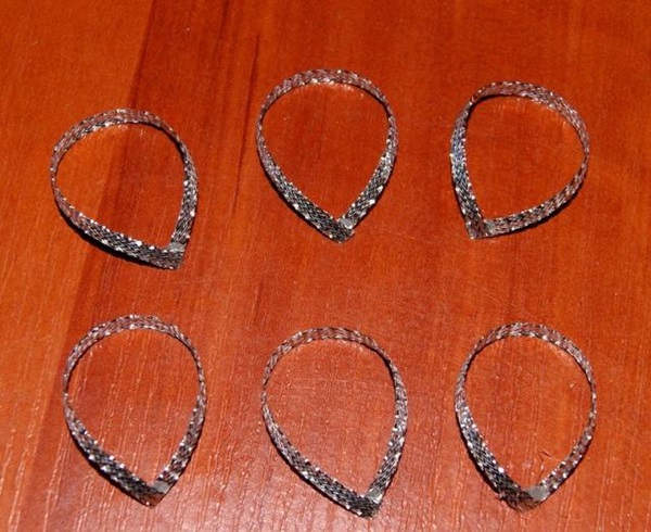 Como fazer um arco de fita de cetim com suas próprias mãos