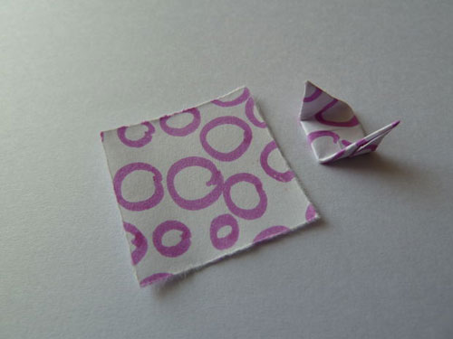 pegue o papel quadrado