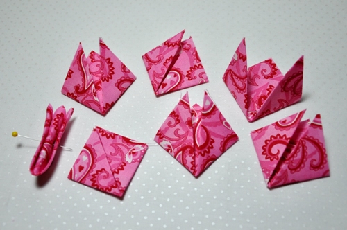 Como fazer flores kanzashi de um tecido com as próprias mãos