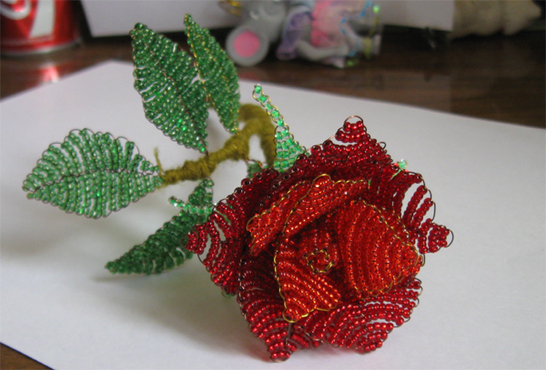 Tecido de rosas de grânulos