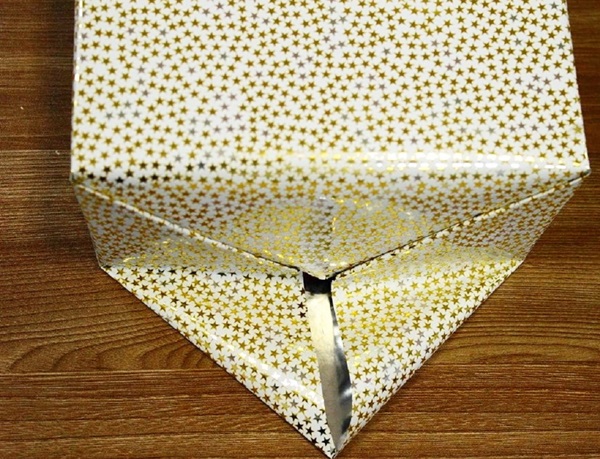 Como embalar um presente em um papel-presente