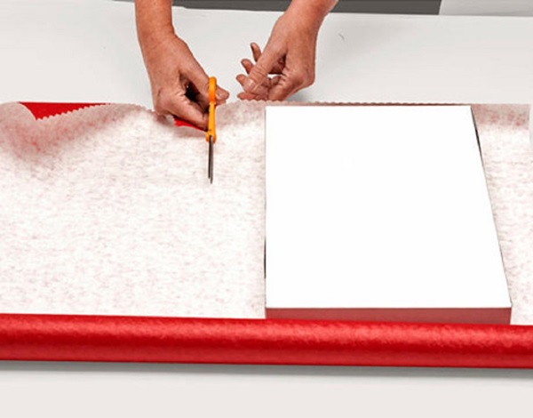Como embalar um presente em um papel-presente
