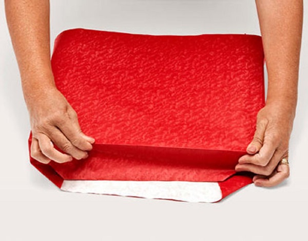 Como embalar um presente em um papel-presente
