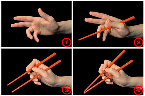 Como segurar varas para sushi
