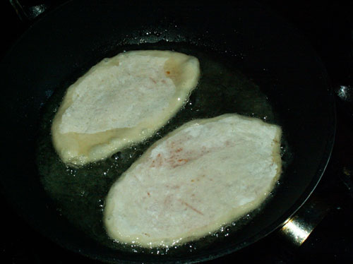 fritar as empanadas fritar as empanadas