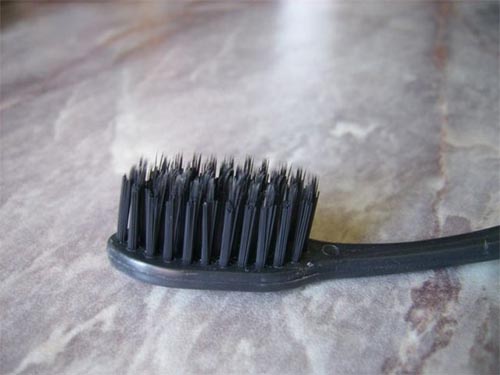Com que frequência devo mudar minha escova de dentes